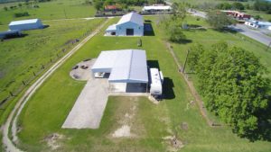 Aerial view of both barns